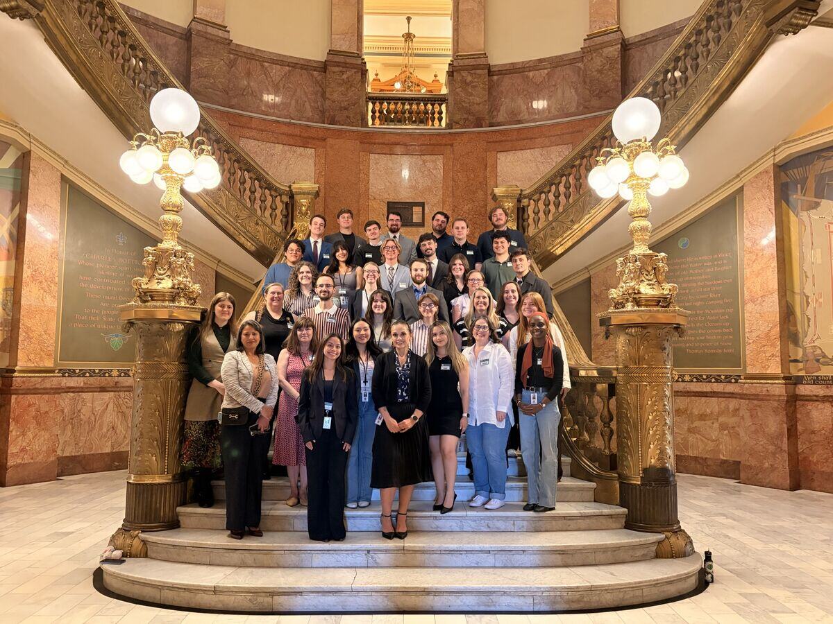 Chad Clifford with staff and interns on the Capitol staircase