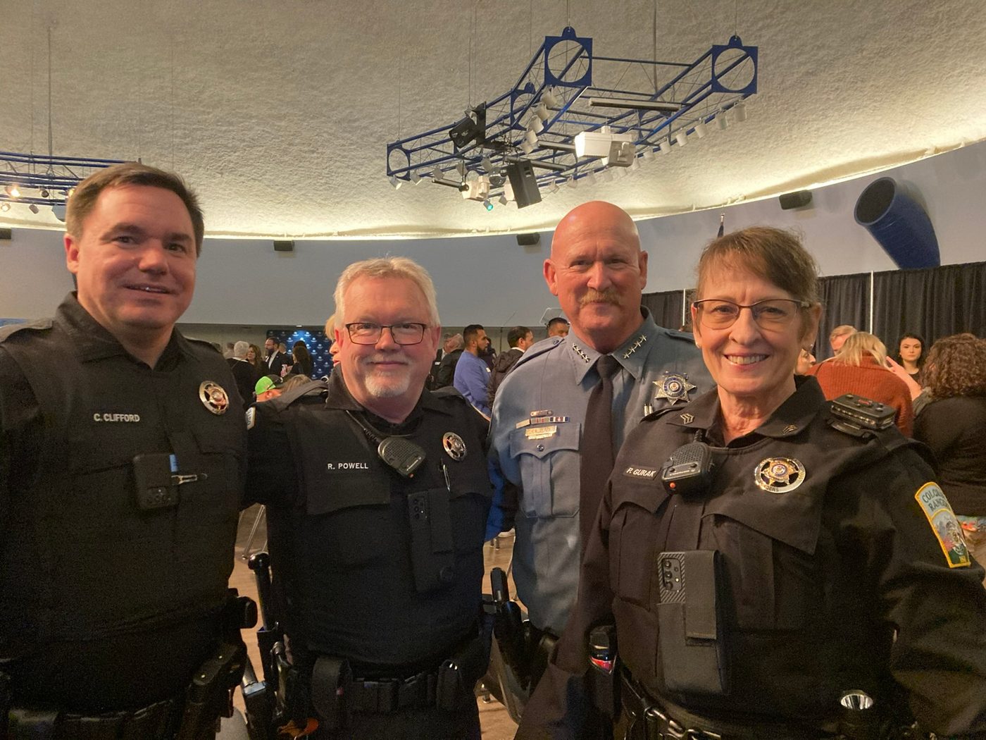 Chad Clifford in uniform with fellow officers